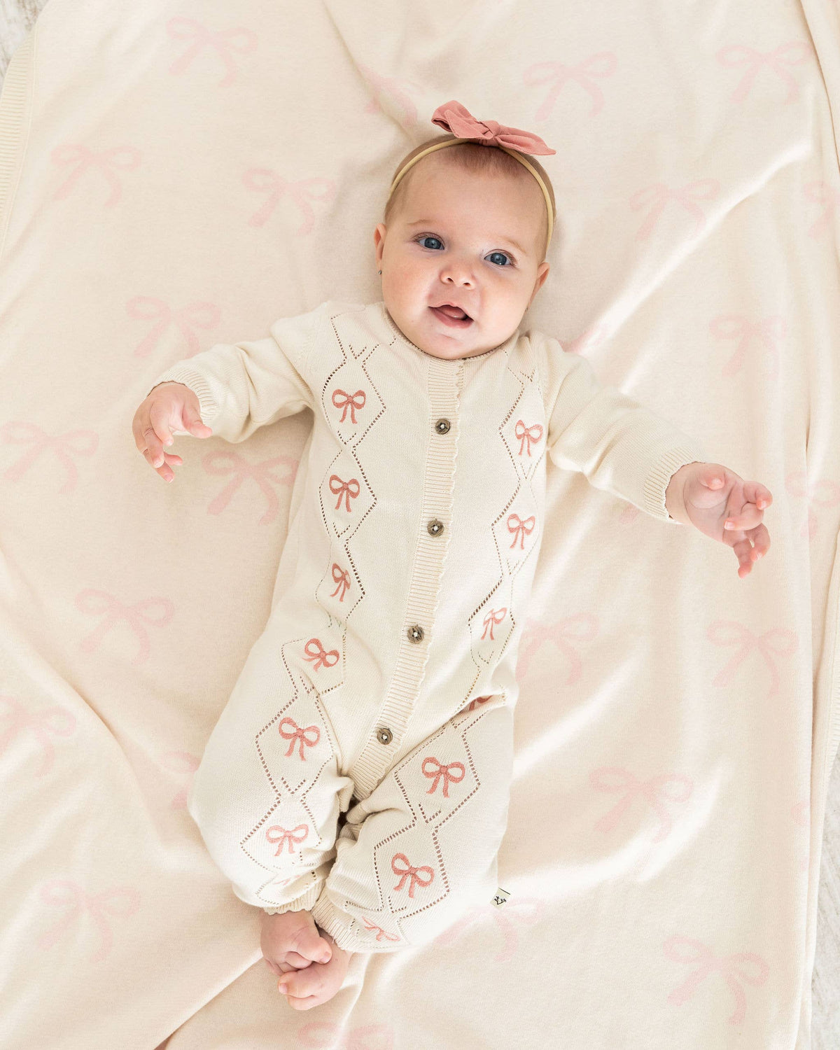 Evie Bow Pointelle Knit Baby Jumpsuit (Organic Cotton)